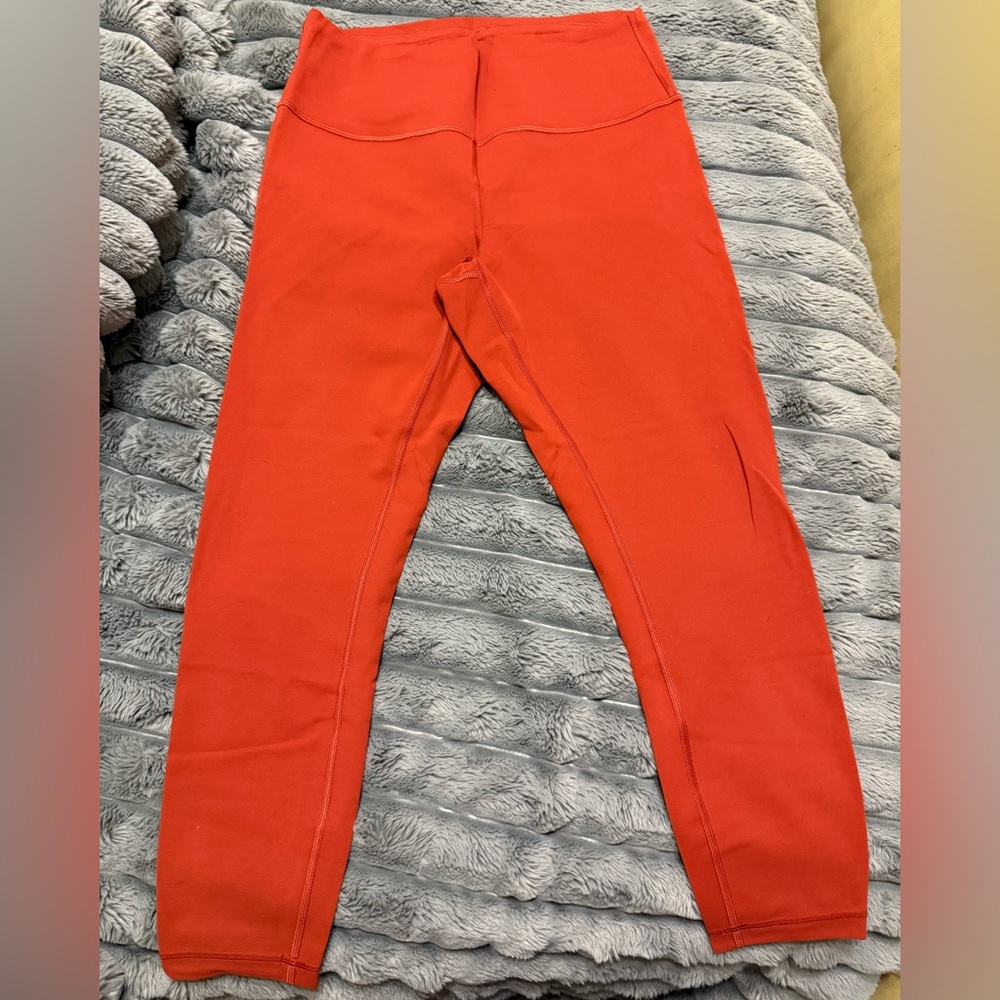 Women orange Lululemon leggings!!!
